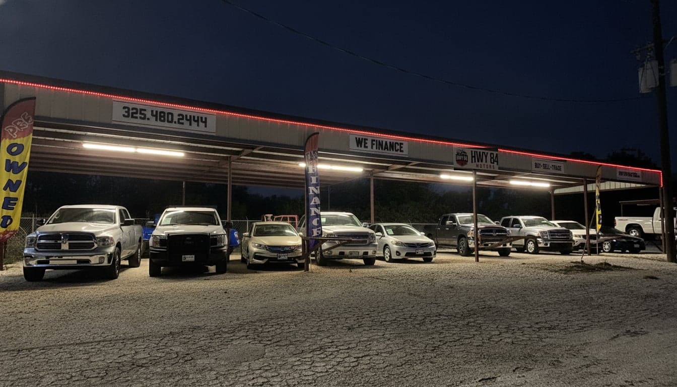 Covered vehicle display at the Hwy 84 Motors location in Lawn on US Highway 84